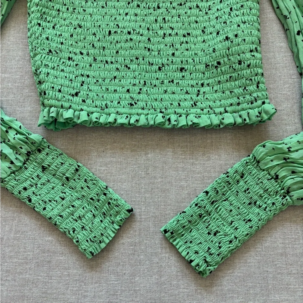 Aritzia green cropped chiffon top.